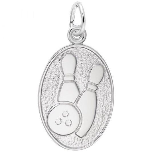 The Bowling Oval Disc Charm in Sterling Silver by Rembrandt Charms features an engraved design of two bowling pins and a bowling ball with three finger holes on a textured background. A small loop at the top allows for easy attachment to a chain or bracelet.