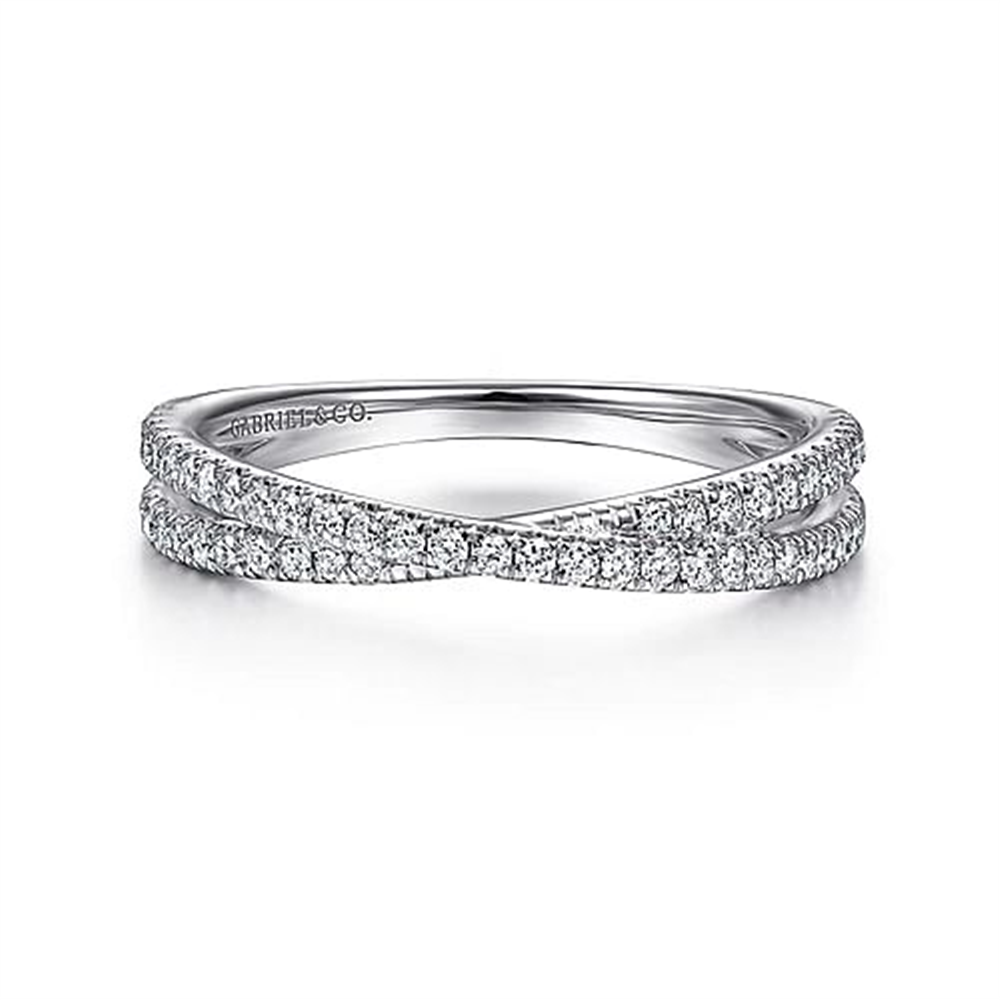 The 14K White Gold Criss Cross Diamond Stackable Ring by Gabriel & Co. boasts a sleek design with an intricate crisscross pattern, embellished with two rows of small, sparkling diamonds. This elegant setting enhances the brilliance and sophistication of the gems, giving the ring a luxurious and refined appearance.