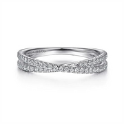 The 14K White Gold Criss Cross Diamond Stackable Ring by Gabriel & Co. boasts a sleek design with an intricate crisscross pattern, embellished with two rows of small, sparkling diamonds. This elegant setting enhances the brilliance and sophistication of the gems, giving the ring a luxurious and refined appearance.