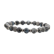 Introducing the INOX Men's 8.5mm Labradorite Stones with Black Oxidized Beads Bracelet. This bracelet is strung on an elastic cord for a comfortable fit and features a mix of smooth labradorite stones and black oxidized round beads. The rustic yet elegant design makes it an ideal accessory for men's jewelry enthusiasts.