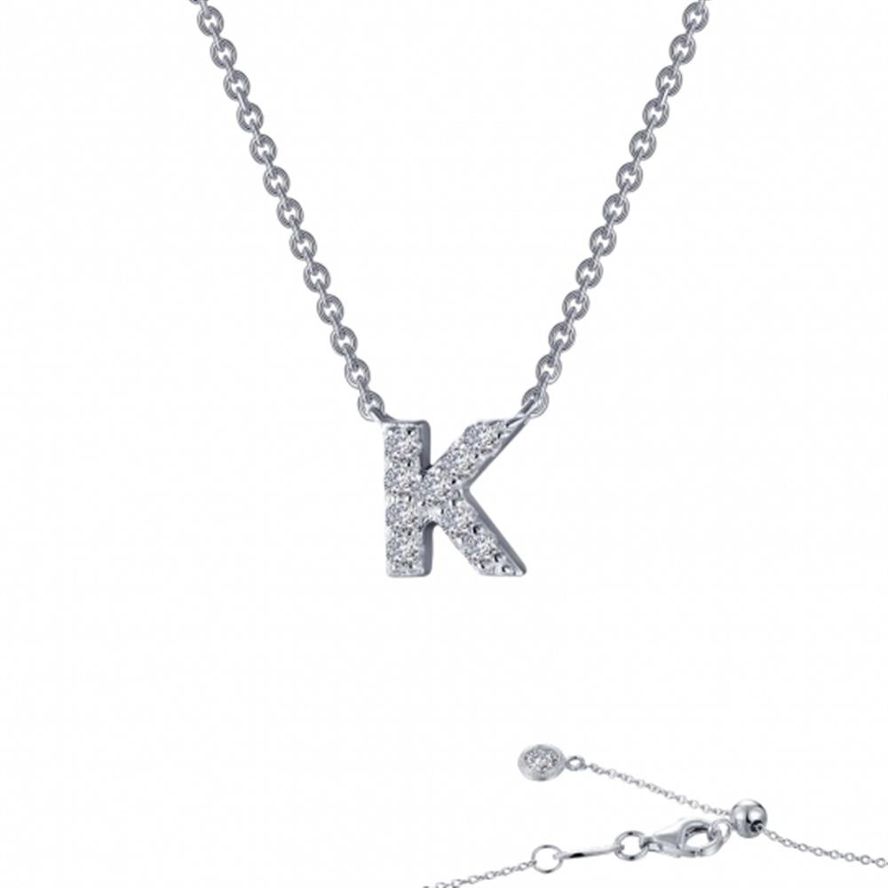 Introducing the Letter K Pendant Necklace by Lafonn, a timeless piece featuring a silver pendant encrusted with genuine sparkling stones. The delicate chain has a simple clasp and extends elegantly below the image.