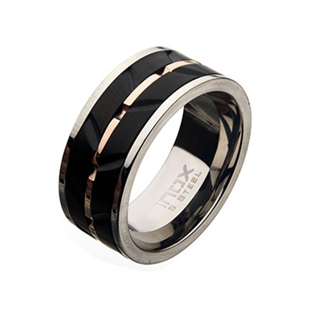 An elegant men's band ring featuring a matte stainless steel black center with rose gold plated accents and diagonal grooves. The ring, from the INOX brand, is inscribed with "INOX S STEEL" inside the band.