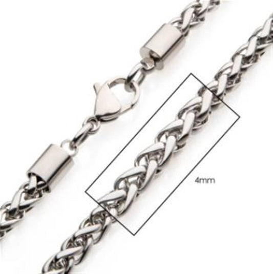 A close-up image of the INOX 4mm Steel Wheat Chain Necklace showcases its intricate stainless steel wheat chain, complete with a lobster clasp and cylindrical end caps. A zoomed-in section accentuates the 4mm width of the detailed chain links.