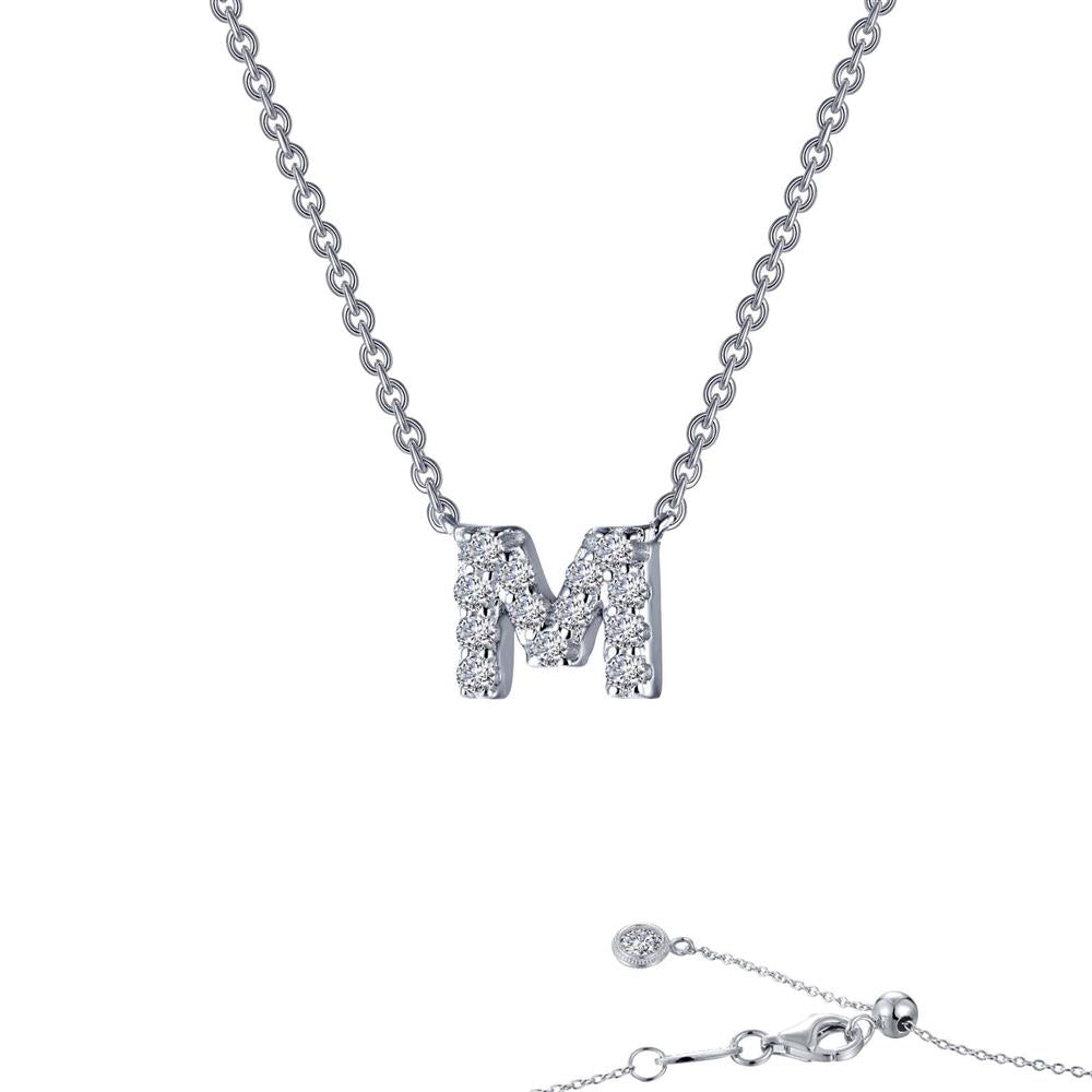 The Lafonn Letter M Pendant Necklace showcases a shimmering silver pendant adorned with simulated diamonds. The chain includes an adjustable clasp and is finished with a small round charm at the end, all beautifully set against a pristine white background.