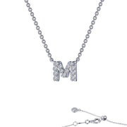 The Lafonn Letter M Pendant Necklace showcases a shimmering silver pendant adorned with simulated diamonds. The chain includes an adjustable clasp and is finished with a small round charm at the end, all beautifully set against a pristine white background.