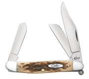 The W.R. Case & Sons Cutlery Co. Amber Bone Peach Seed Jig Stockman is a pocket knife featuring three open blades of varying sizes and shapes, ideal for different cutting tasks. It boasts a textured Amber Bone handle with a brown, bone-like appearance, metal accents, and an oval logo plate engraved with "Case.