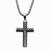 The Men's Steel Scale Cross Drop Pendant with Bold Box Chain by INOX features a cross-shaped design interwoven intricately. The pendant has a textured surface, giving it a unique and detailed appearance. The 22-inch bold box chain is composed of small, rectangular links for added sophistication.