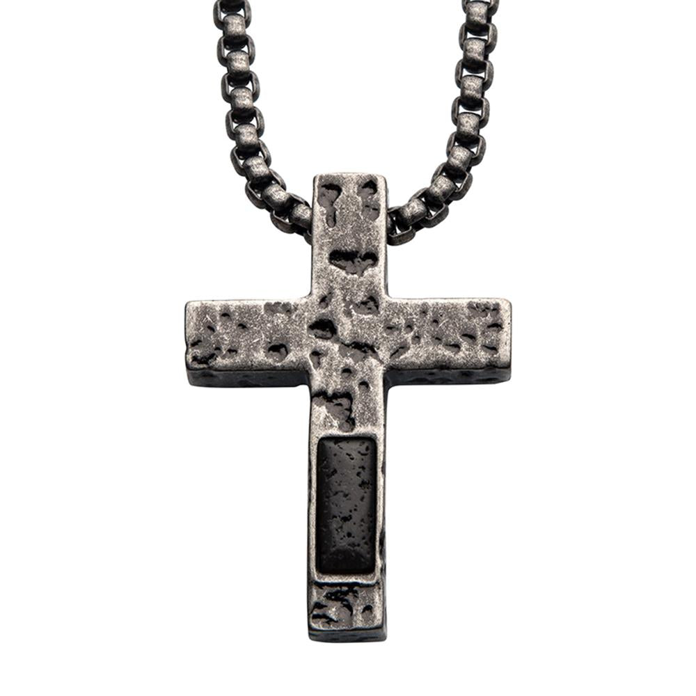 A rugged, metallic Stainless Steel Silver Plated Cross Pendant with a weathered look featuring a Lava Stone Pendant hangs from a thick steel box chain. This cross pendant, crafted by INOX, has an intricate inset design that gives it a distinct and rustic appearance. Ideal for men's jewelry collections seeking bold and timeless pieces.