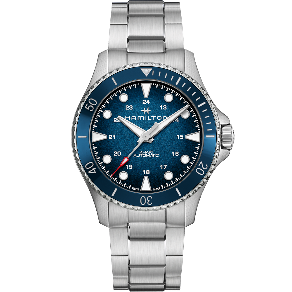 The Hamilton Khaki Navy Scuba Automatic Watch showcases a 43mm case paired with a stainless steel bracelet. This men's wristwatch features a round blue dial with silver hour markers, luminescent hands, and a date function positioned at 4 o'clock. The blue bezel sports silver indices and the watch is water-resistant up to 300 meters.
