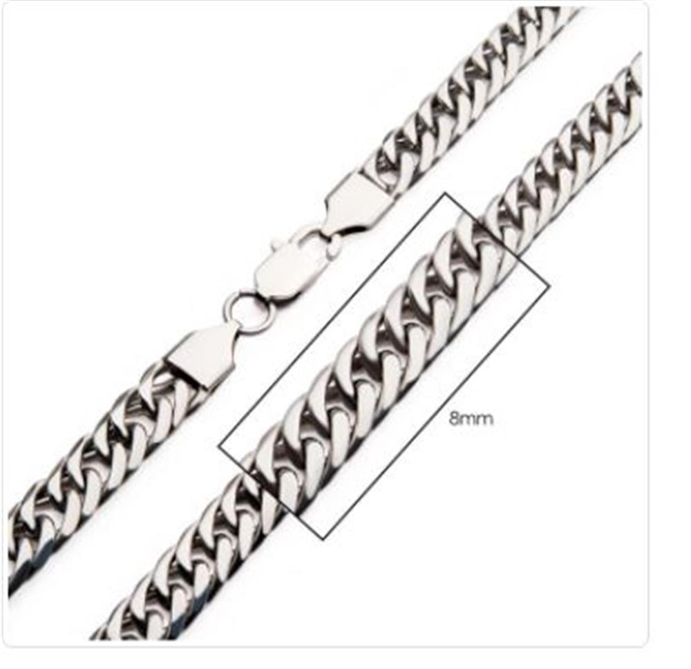 A close-up image of the 8mm Steel Dome Curb Chain bracelet by INOX, showcasing its silver links and lobster clasp. A highlighted box indicates the width of the links as "8mm." This elegant piece can seamlessly complement any stainless steel necklace, adding a refined touch to your ensemble.
