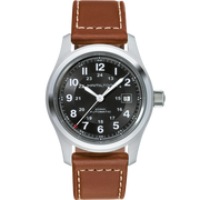 A close-up of the Hamilton Khaki Field Automatic Watch | 42mm, showcasing its silver case, black dial, and white hour markers. Featuring an H-10 automatic caliber with an impressive 80-hour power reserve, it includes a date window at the 3 o'clock position and is paired with a brown leather strap adorned with white stitching.