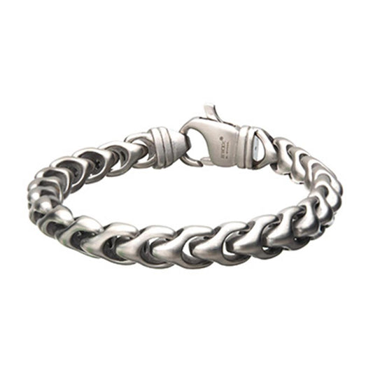 The Matte Stainless Steel Big 11mm Chain Bracelet by INOX, featuring an 8.5" length and a curved link design, is crafted from stainless steel with a sturdy clasp. Its polished finish provides a durable and contemporary look.