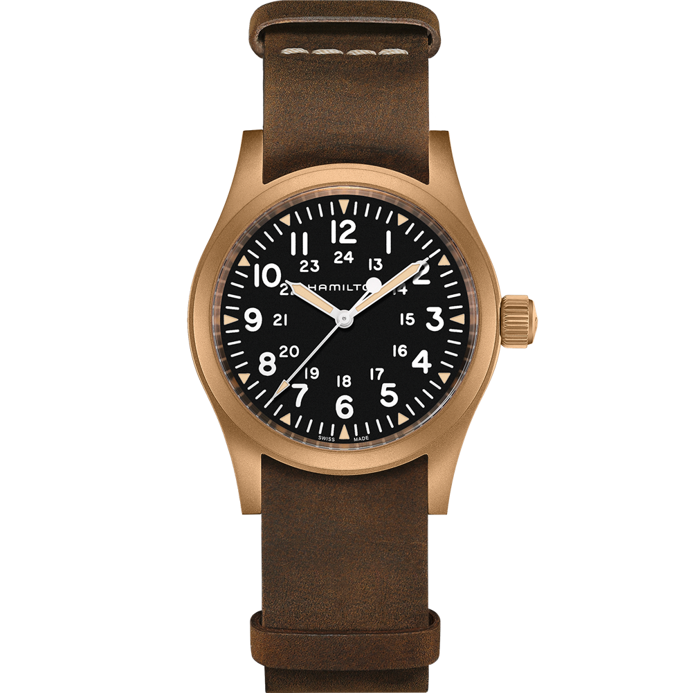 Presenting the Hamilton Khaki Field Mechanical Watch, showcasing a stylish brown leather strap paired with a 38MM bronze case. The black dial is adorned with white numerals and features a 24-hour format in smaller font within the primary 12-hour markings. Luminescent hands and the "Hamilton" brand name positioned below the 12 o'clock mark complete this elegant timepiece.