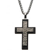 The INOX Men's Stainless Steel & Carbon Fiber Pendant Necklace features a contemporary design with a textured center and smooth, dark border. Hanging from a silver chain, this distinct piece showcases the brand's signature blend of materials that highlights its unique central pattern.
