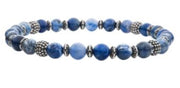 The INOX Men's 6mm Blue Sodalite Stones with Black Oxidized Beads Bracelet showcases an exquisite design with polished blue sodalite stones varying in shades that alternate with silver-colored ornamental and black oxidized beads, adding a dynamic, textured appearance and sophisticated elegance to the bracelet.