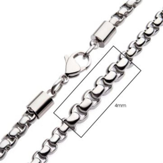 Close-up of the INOX 4mm Steel Bold Box Chain Necklace with a lobster clasp and cylindrical connectors. The image emphasizes the thickness of the chain, highlighting its sturdy craftsmanship in a striking 24" length.