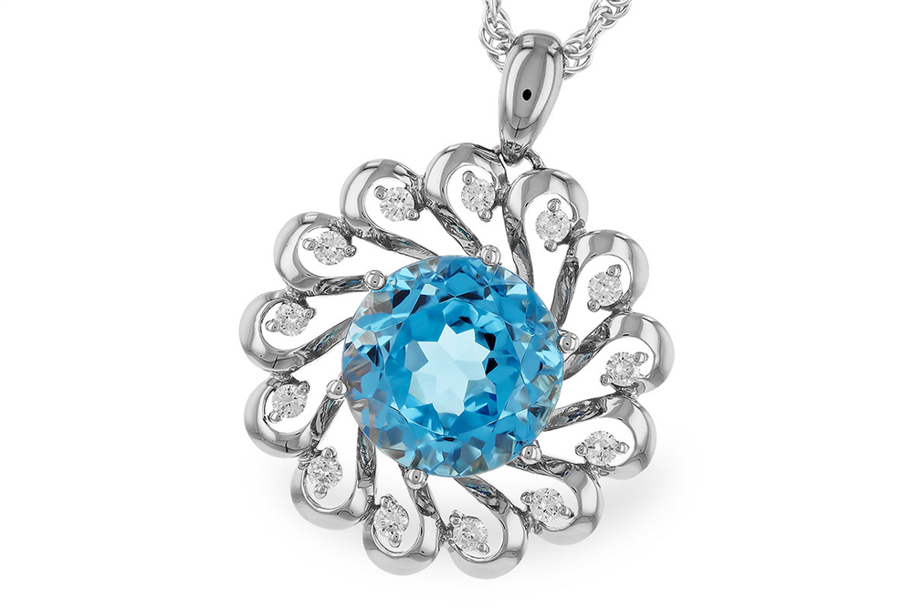 Introducing the Allison Kaufman Swiss Blue Topaz and Diamonds 14K White Gold Necklace, showcasing an exquisite large round Swiss blue topaz at its center, surrounded by diamond accents that form a refined floral pattern. This elegant pendant is suspended from a delicate silver chain, radiating sophistication and charm.
