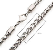 A close-up image of the INOX 4mm Steel Wheat Chain Necklace. The stainless steel chain features a lobster clasp, with a rectangle highlighting its 4mm thickness and its 22" length clearly labeled.