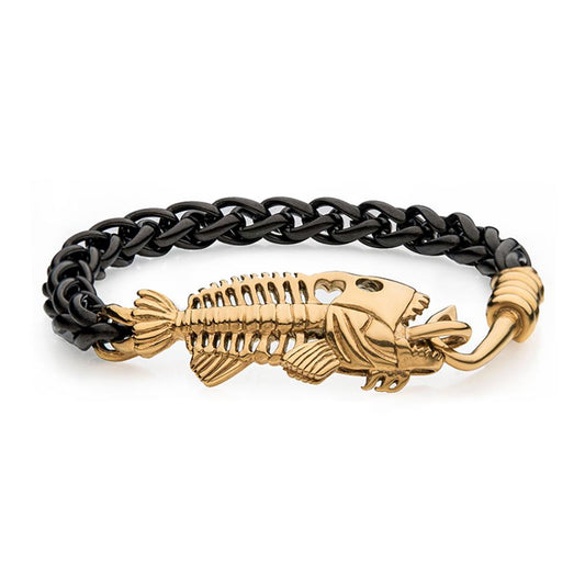 The Black Plated Wheat Chain with Gold Plated Fishbone on Hook Clasp Bracelet by INOX features a black braided wheat chain and an 18K gold-plated fish skeleton adorned with heart-shaped cutouts, scales, and fins. The fish's mouth holds a hook that integrates seamlessly into the clasp of this stylish men's stainless steel bracelet.