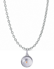 Introducing the Avonlea Mustard Seed Charm on Cable 18" Chain Necklace in Sterling Silver; this piece features a delicate silver chain adorned with a circular pendant. The pendant showcases a textured surface with a small, subtle dot in the center, echoing the minimalist and refined aesthetic of the Mustard Seed Charm, offering an elegant and simple look.