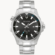 A Bulova Marine Star Watch | 96B382 from the Bulova Watch Company, featuring a silver-plated case and a black dial with white hour markers and hands, a date display, and a stainless steel link bracelet. This sleek, modern timepiece has a crown on the right side and an additional button on the left, making it perfect for the discerning man’s watch collection.