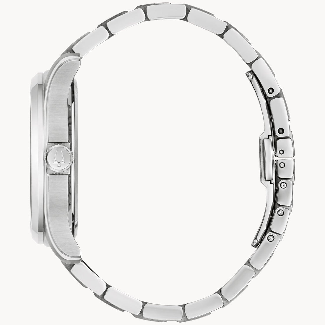 A side view of the Bulova Wilton Classic Watch | 96B386, from the esteemed Bulova Watch Company, showcases its elegant silver stainless steel construction. The timepiece features a sleek, brushed metal finish with a sophisticated metal link bracelet and a prominent circular crown on the side, adorned with an engraved small ship icon. The clasp is visible on the right side.