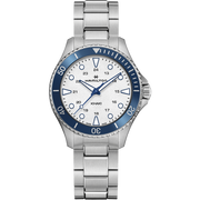 The Hamilton Khaki Navy Scuba Quartz 37mm watch boasts a stainless steel bracelet and a circular silver dial. This high-seas style timepiece features a blue bezel with white numerals, silver hour markers, and a date window at the 4 o'clock position. The hour and minute hands are silver with a blue second hand.