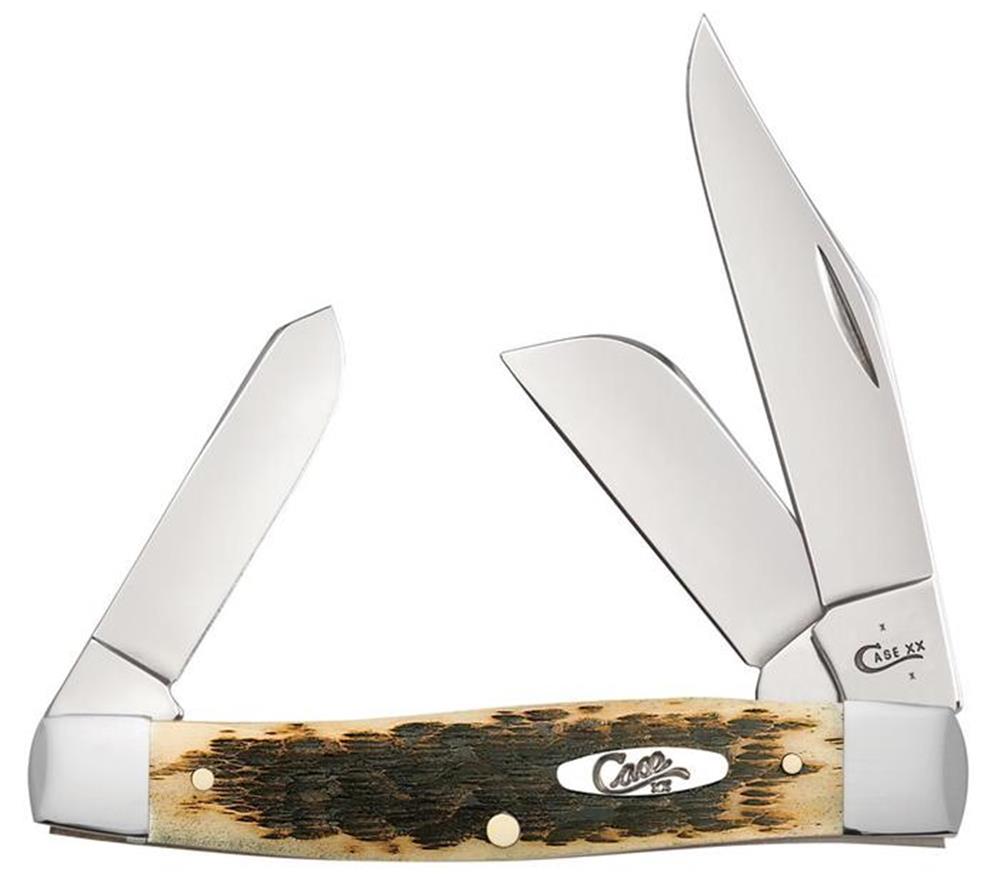 The "Large Stockman Knife" by W.R. Case & Sons Cutlery Co. features four shiny stainless steel blades of varying sizes and shapes. Its light brown handle, crafted from Amber Bone with darker textured spots and metal bolsters, exudes rustic elegance.