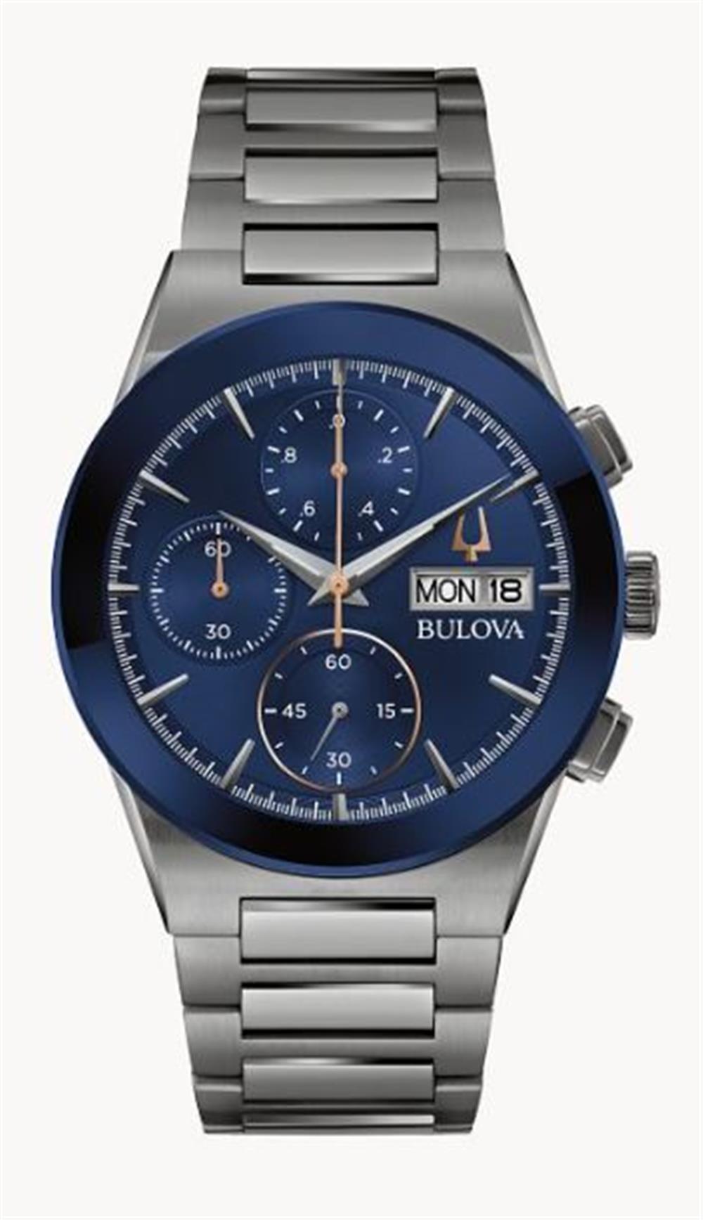 The Bulova Millennia Modern Watch | 98C143 by Bulova Watch Company is a sophisticated silver wristwatch with a striking blue face. It features three smaller subdials, a day-date display, and proudly displays the brand name "Bulova." This contemporary men's watch boasts a stainless steel bracelet and silver hands accented with gold-tone details on both the main dial and the subdials.