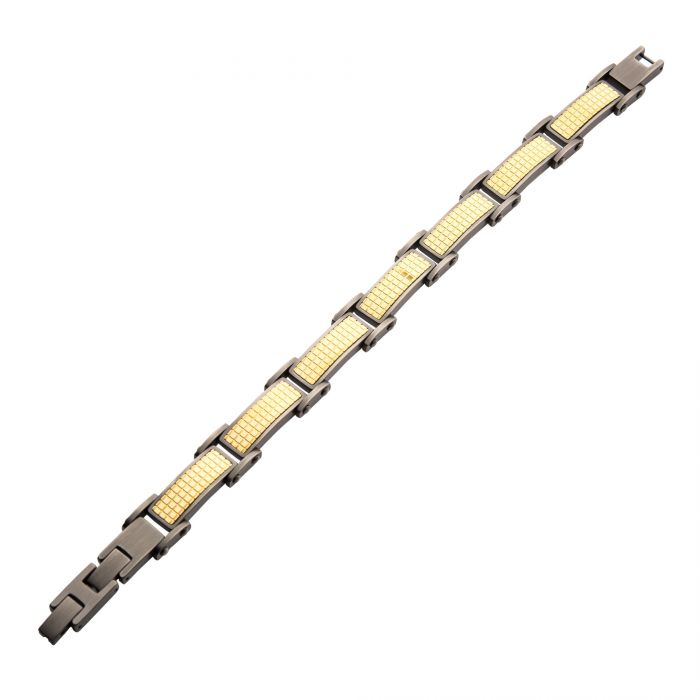 The INOX Gun Metal Plated Bracelet with 18K Gold showcases alternating rectangular links in gun metal plated and silver finishes. The gold segments feature a sleek grid pattern while the silver sections act as connectors. Adjustable links enhance its modern and classy appeal, making it a stylish accessory for men.