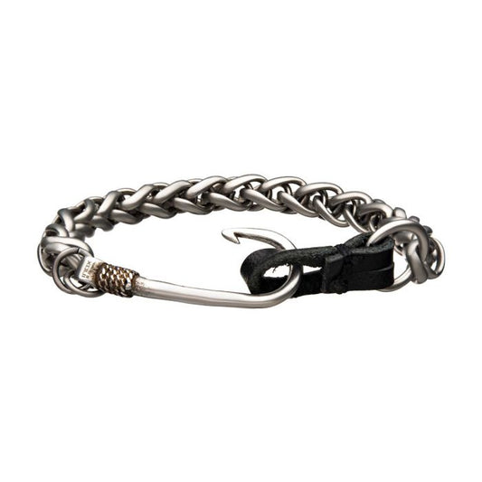 The INOX Stainless Steel and Antiqued Finish Hook with Black Leather Chain Bracelet for men features interlinked metal chains and a prominent, intricately detailed fish hook clasp. The clasp, secured with black leather threading, creates a rugged, nautical aesthetic while blending silver and darker tones for an antiqued look.