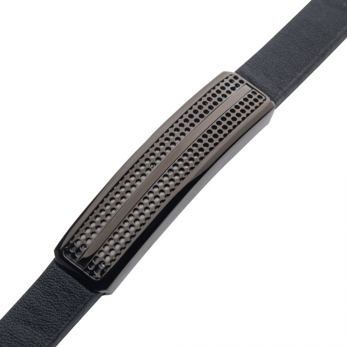 Close-up of the INOX Men's Black Leather with Black IP Streamline ID Bracelet featuring a sleek, rectangular metal centerpiece. The centerpiece is designed with a mix of textured dots and smooth lines, adding an elegant and modern touch to this 8.5" adjustable bracelet. It also includes a slide magnetic clasp for easy wear.