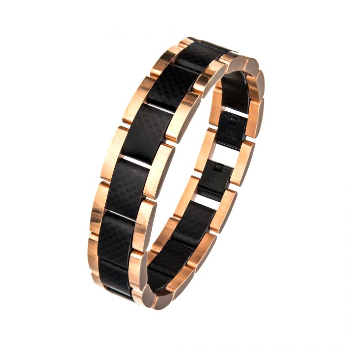 The INOX Black and Rose Gold Plated with Carbon Fiber Link Bracelet is a stylish men's accessory featuring alternating black carbon fiber and rose gold plated rectangular links. It includes a clasp and boasts a contemporary design, making it suitable for both casual and formal wear.