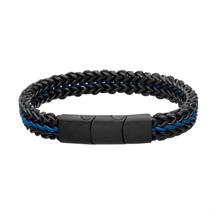 A close-up view of the Allegiance Stainless Steel Bracelet by INOX, showcasing its intricate black braided design with blue accents crafted from Blue Wax Cord. The bracelet features a magnetic slide clasp composed of three seamless segments, effortlessly blending with the overall braided pattern.