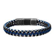 Introducing the Allegiance Stainless Steel Bracelet by INOX, a men's bracelet that features a dual-layered design with black and blue wax cord. The metallic clasp ensures a sturdy closure, giving it a rugged yet stylish appearance perfect for those who appreciate stainless steel craftsmanship.