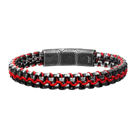 The Allegiance Red Stainless Steel Bracelet by INOX features interwoven black, silver, and red wax cord strands. It has a metallic clasp with an industrial design, combining rugged and stylish elements for a modern look.