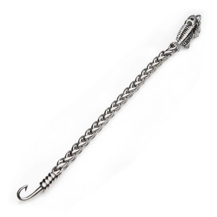 A silver twisted metal keychain with a fishbone design on one end and a hook on the other. Crafted from stainless steel, the keychain features intricate detailing, including the fish head and spine, giving it a unique and artistic appearance reminiscent of the INOX Polished Steel Wheat Chain with Fishbone on Hook Clasp Bracelet.