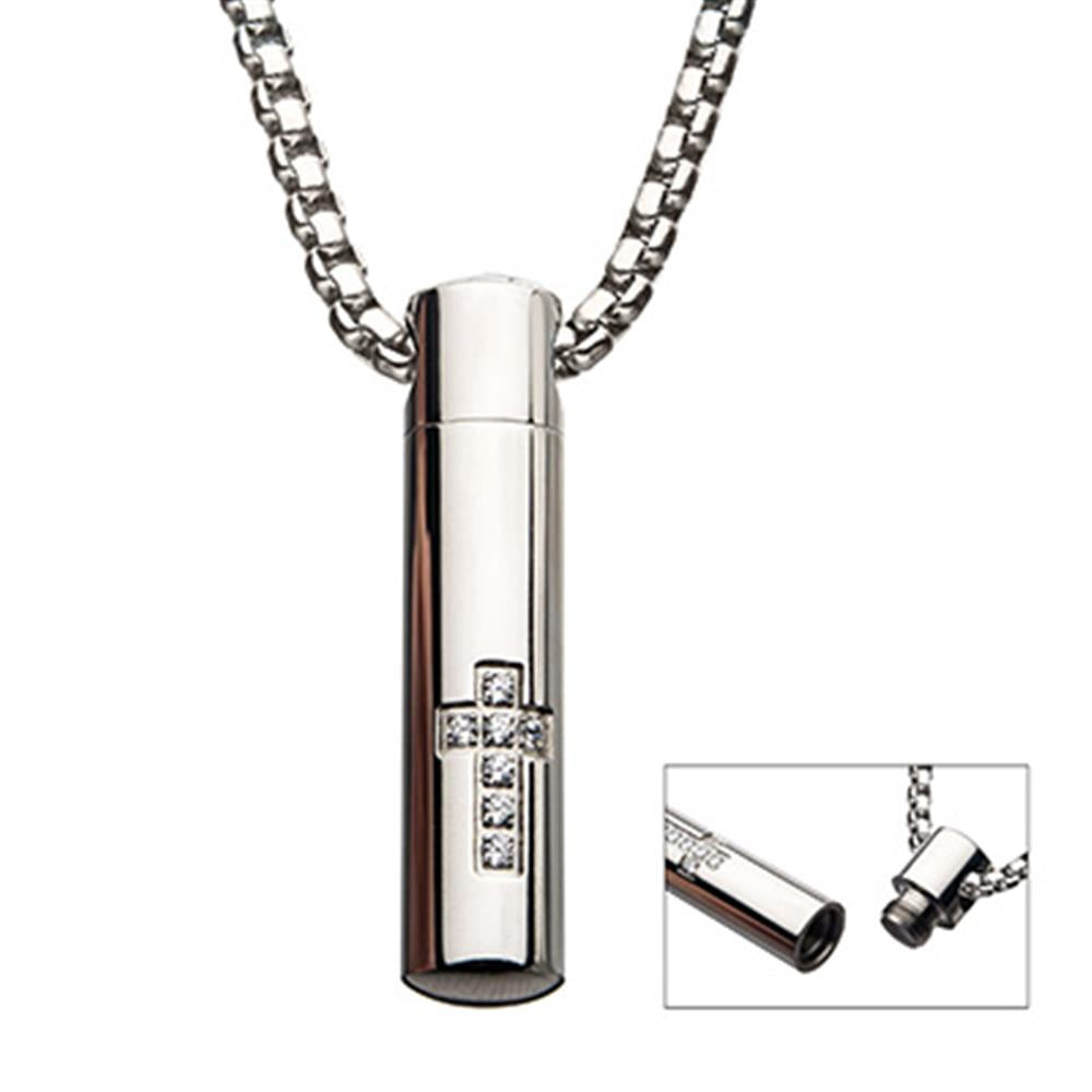 The INOX Stainless Steel Memorial Cross Pendant with Clear CZ features a silver cylindrical design hanging from a 22-inch steel box chain, adorned with a cross design made from clear CZ gemstones. An inset image reveals the pendant unscrewed to show a hidden compartment inside.