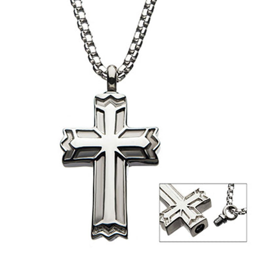 A Stainless Steel Memorial Gothic Cross Pendant from INOX, featuring intricate edges, hangs elegantly from a steel box chain. An inset image reveals the back of this men's pendant with a threaded screw-on cap at the base, indicating it can open to store small items.