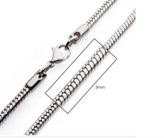 Close-up view of the INOX 3mm-wide Steel Rattail Chain, measuring 22 inches in length, showcasing a rectangular section. The necklace is secured with a lobster clasp closure.