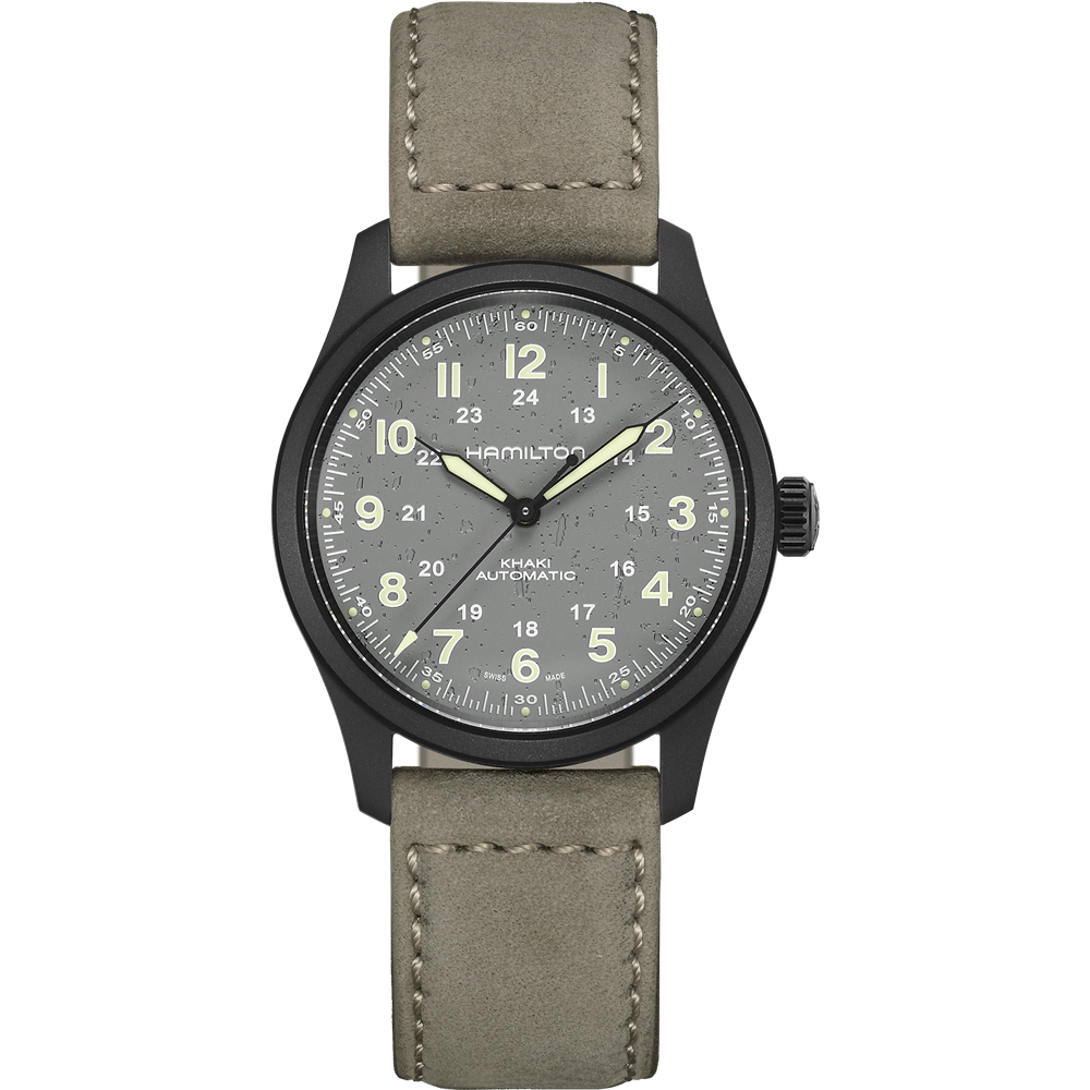 A Hamilton Khaki Field Titanium Automatic 38mm watch, featuring a matte black titanium case and gray dial, paired with a beige leather strap. The dial is accented with luminous hands and numerals, includes a 24-hour inner ring, and has a date display at the 3 o'clock position. The strap features white stitching along the edges—an embodiment of classic military watch design.