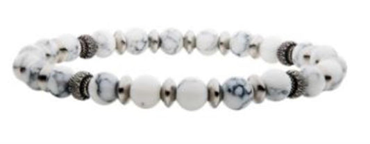 The INOX Men's 6.5mm White Howlite Stone bracelet features stones with subtle gray veining, complemented by black oxidized beads. The bracelet is designed in a symmetrical pattern, alternating the stone beads with metallic spacers for a balanced and stylish look.