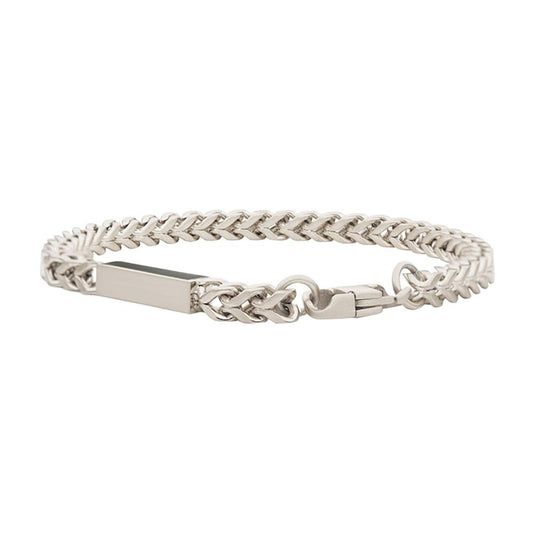 The INOX Stainless Steel Engravable ID Block with Franco Chain Bracelet | 8.5" features a polished rectangular engravable ID block in the center, complemented by a silver Franco chain that provides a textured and elegant look. It includes a sturdy clasp for secure wear.