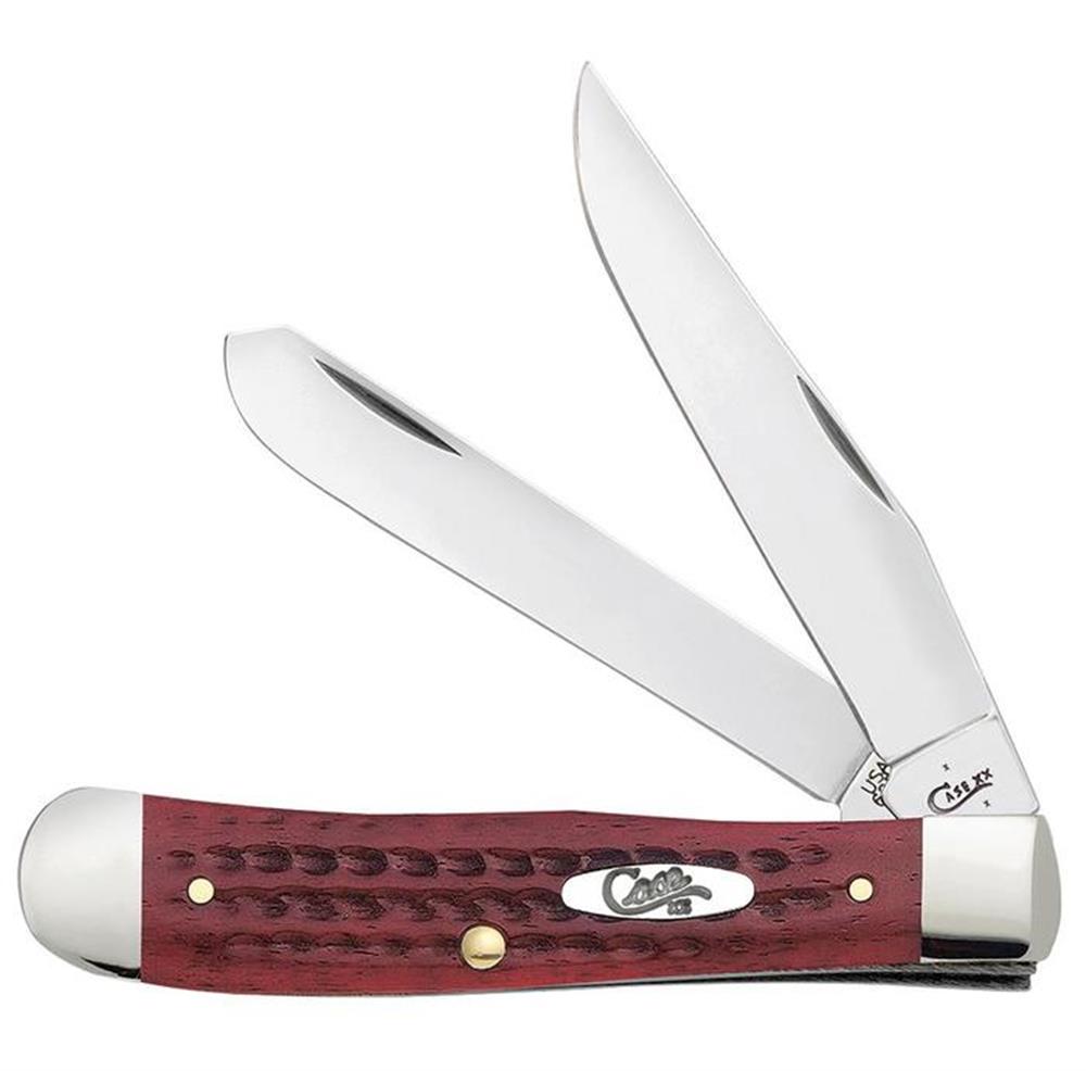 The Pocket Worn Old Red Bone knife by W.R. Case & Sons Cutlery Co. is a classic Trapper pocket knife featuring two open stainless steel blades. Its handle, made from Old Red Bone with a Corn Cob Jig pattern, is adorned with polished metal bolsters and brass pins, proudly displaying the emblem with the brand’s logo.