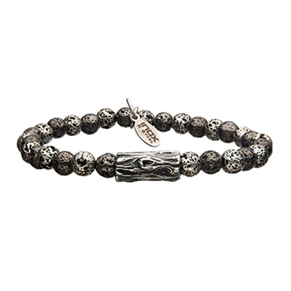 The Men's 6mm Hematite Bracelet by INOX features black and gray speckled Hematite beads. At its center, there's a silver rectangular charm with intricate engravings, accompanied by a small tag labeled "INOX." This elastic bracelet is designed to stretch for a comfortable fit.