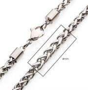 Close-up of the 4mm Steel Wheat Chain Necklace by INOX. This men's stainless steel necklace features a twisted design with interlocking links, measures 4mm in width, and ends with rectangular metal caps secured by a lobster clasp.