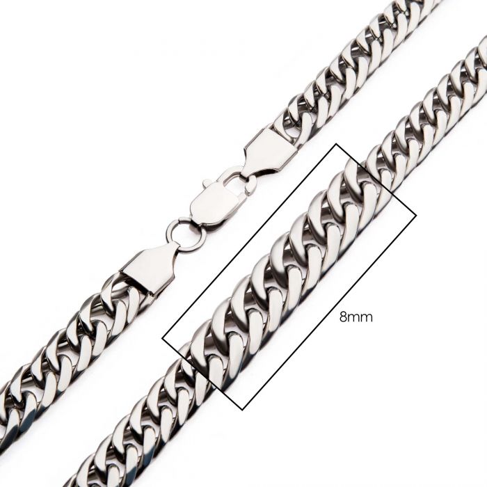 Close-up of the 8mm Steel Dome Curb Chain by INOX. This men's stainless steel Cuban link chain necklace features a lobster clasp and a robust, polished appearance. The thick, closely interlocked links give it a sturdy yet stylish look, making it an excellent accessory for those seeking durability and elegance.