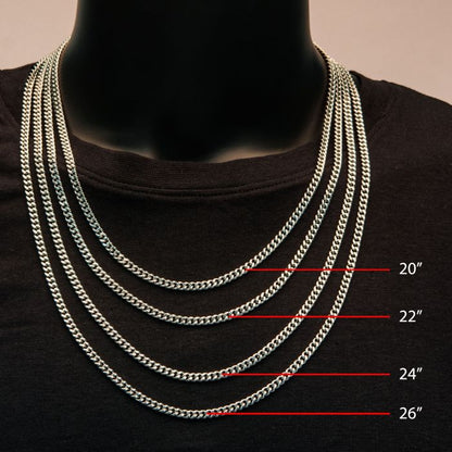 A black mannequin head and torso display four different lengths of the INOX 4mm Steel Diamond Cut Curb Chain Necklace on a black background. The stainless steel chains, including the 22" necklace, are labeled with their lengths from top to bottom: 20", 22", 24", and 26".