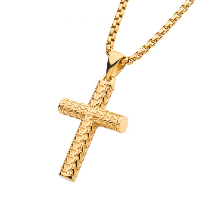 The Polished 18K Gold IP Scale Cross Drop Pendant from INOX, featuring an intricate and textured design, hangs elegantly from a matching bold box chain. The pattern of the chain enhances the overall elegance of this jewelry piece against a white background.