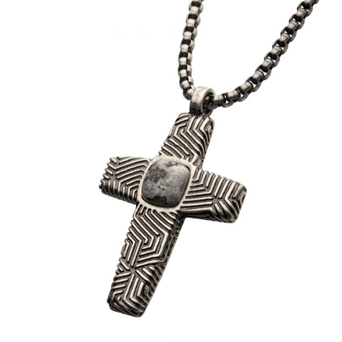 Elevate your style with the Stainless Steel Silver Plated Cross Pendant with Gray Jasper Stone by INOX. This cross, showcasing intricate geometric patterns and a central gray jasper stone, comes on a sturdy steel box chain and creates a striking focal point for any outfit.